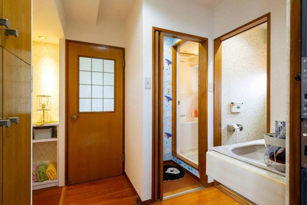 7th Floor Apartment: Airport-accessible Urban Retreat *