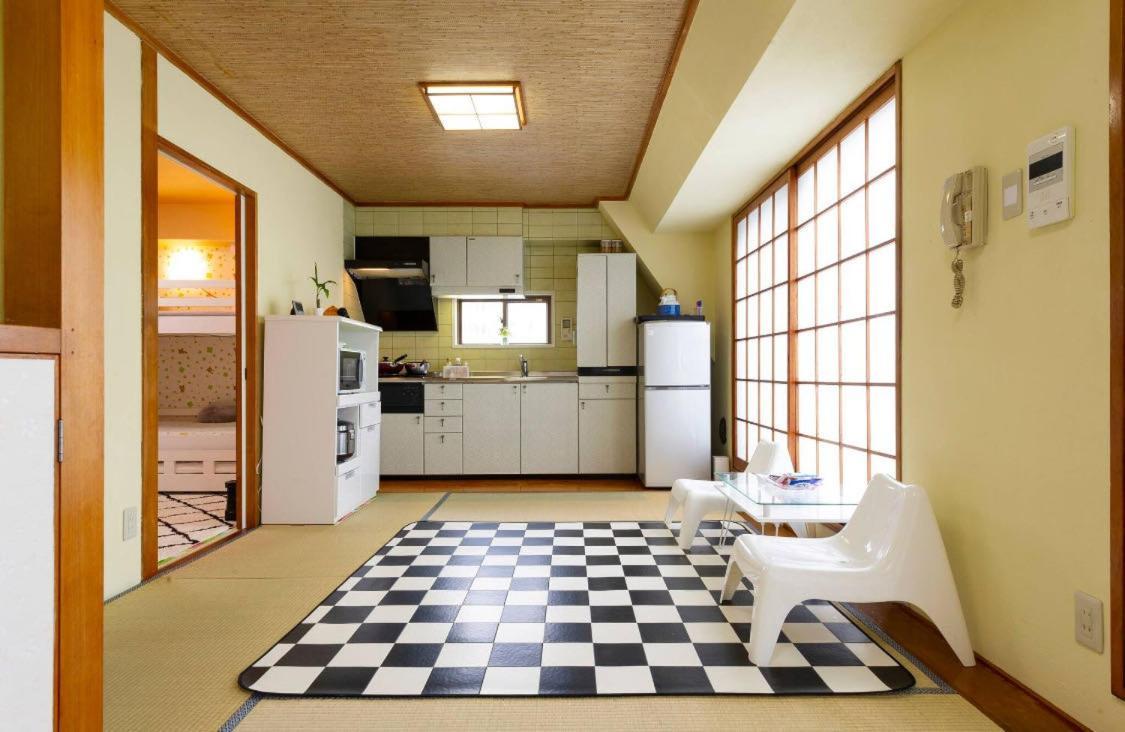 7th Floor Apartment: Airport-accessible Urban Retreat *